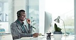 Call center, telemarketing and black man consultant in the office with an online consultation. Contact us, crm and young African male customer service or sales agent working on computer in workplace.