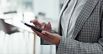Closeup, hands and a person with a phone at work for contact, reading email or notification. Business, office and a corporate employee with a mobile for typing a chat, internet or search on the web