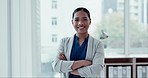 Crossed arms, smile and face of businesswoman in office with confidence, happiness and career. Pride, professional and portrait of young female lawyer from Mexico with positive attitude in workplace.