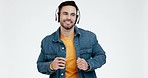 Man, headphones and dance with listening, studio and audio streaming with memory by white background. Happy young dancer, smartphone and mobile app for music, sound tech and subscription with energy