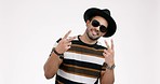 Fashion, peace sign and man with sunglasses on a white background with trendy clothes, style and outfit. Happy, relax and portrait of isolated person with hand gesture, symbol and emoji in studio