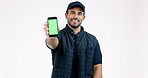 Happy man, delivery and phone mockup screen in advertising against a grey studio background. Portrait of male person or courier guy show mobile smartphone display in marketing or supply chain service