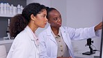 Laboratory, computer and scientist women with working, research and medical study in hospital. Working, collaboration and science investigation in a lab with a woman worker and chemistry experiment