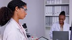 Virus study, computer and woman scientist with science and medical research for disease. Hospital, staff and female professional with online data results in a healthcare and pharmaceutical laboratory