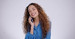 Woman, happy and phone call for communication, talking and networking on a white background. Young and natural african  person on mobile or voip for gossip, news and funny conversation in studio