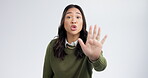 Hand, stop and woman with warning, danger and caution with yelling isolated on white background. Gesture, signal and security, no entry and portrait, rejection and protest, palm and fight in studio