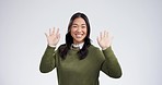 Dance, excited and happy Asian woman on a white background for celebration, freedom and party. Happiness, joy and portrait of isolated person dancing for winning, good news and success in studio