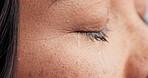 Crying, eyes and sad woman closeup with depression, mistake or mental health crisis, trauma or fear. Zoom, tears and face of female person with anxiety, stress or broken heart, grief and fail regret