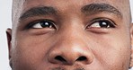 Thinking, eyes and black man with decision, choice or problem solving, doubt and brainstorming in studio. Zoom , portrait and half face of model with why emoji, questions or solution, idea or plan