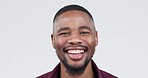 Happy, face and a black man on a white background, laughing and showing confidence. Smile, young and portrait of an African person or model looking cheerful with an expression on a studio backdrop