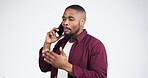 Frustrated, phone call and black man angry for bad customer service isolated in a studio white background. Angry, annoyed and young person talking with on mobile conversation upset by mistake or fail