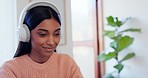 Music, headphones and studying with woman at a home with learning podcast and audio. Study, female student relax and house with web radio and listening to internet sound and streaming online 