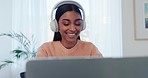 Music, headphones and computer with woman smile at a home with happy dancing and audio. Study, female student relax and house with web radio and listening to internet sound and streaming online 