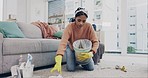 Cleaning, trash and tired with woman in living room for hygiene, housekeeping and frustrated. Fatigue, sanitary and disinfection with person in apartment home for cleaner, maid and detergent