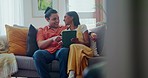 Happy couple, tablet and laugh on sofa in living room for online shopping, streaming movies and subscription. Man, woman and hug with digital technology for social media, conversation and funny meme