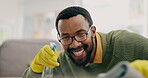 Black man, spray bottle and cleaning table in house living room for virus safety, bacteria and furniture dirt. Smile, happy and African person with fabric cloth, liquid or chemical product for desk