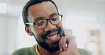 Happy, thinking and a black man with remote work on a laptop for planning, solution or email. Smile, house and an African entrepreneur reading information from a computer for an idea while working