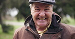 Face, smile and funny with a senior man laughing outdoor in a park closeup for freedom, comedy or humor. Portrait, happy and retirement with an elderly person in a garden during summer or spring