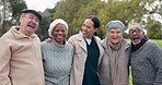 Hug, face and a caregiver with people in nature for bonding, conversation and a joke. Laughing, portrait and a nurse with senior or elderly friends with happiness in a garden for retirement together