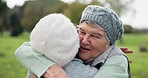 Smile, love and senior friends hugging in a park for bonding on a walk for fresh air together. Nature, happy and elderly women in retirement embracing for care, connection or reunion at a garden.