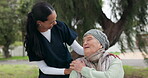 Nurse, park and a senior woman in a wheelchair at the park, laughing together for freedom or a funny joke. Healthcare, medical or assisted living with a carer and patient walking outdoor in a garden