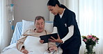 Tablet, support and a nurse with a patient in the hospital to explain good news results during consulting. Medical, healthcare and data with a female medicine professional talking to a senior man