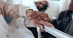 Bedroom hands, sick and elderly people support, compassion or interracial partner rub coma patient for empathy. Couple, rehabilitation recovery or closeup senior person comfort hospital client on bed