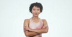 Portrait, sports and woman with arms crossed, fitness and healthy girl on a white studio background. Face, person or athlete with workout, wellness and confident model with a smile, happy and energy