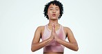 Breathing, meditation and woman with praying hands in studio for energy training on white background. Peace, wellness or lady meditating with yoga pose for mental health, balance or holistic exercise