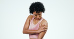 Shoulder, pain and woman with sports injury in studio for health risk, bruise and joint wound. Fitness, athlete and accident of arm muscle, fibromyalgia and first aid for exercise on white background