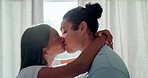 Happy, couple kiss and love in home lens flare, bonding and romance together in the morning. Intimate, interracial and man and woman smooch for care, healthy relationship and commitment to marriage