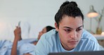 Laptop, email and man with a couple in bed to relax in the evening while blogging or learning online. Computer, internet and a young person in the bedroom of a home with his girlfriend for education