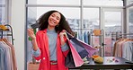 Portrait, woman with credit card and shopping bag in store for fashion payment. Happy, plastic money and face of African customer with gift in retail sales, discount deal or finance in boutique mall