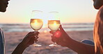 Sunset, beach and hands of couple with wine for love, relax or celebrate anniversary date. Closeup, people and cheers at sea with alcohol drink, champagne or celebration of vacation, holiday or party