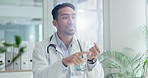 Medical, consultation and man doctor in his office at hospital counting for diagnosis talking to patient. Career, professional and Indian male healthcare worker speaking for treatment plan in clinic.