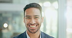 Businessman, laughing and face in a office with funny joke, comedy and fun at work. Happy, smile portrait and male professional in a creative agency workplace with a worker and staff with job pride