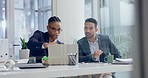 Laptop, meeting and collaboration with business men talking in the boardroom of their corporate workplace. Computer, teamwork and strategy with an employee team working on marketing or design
