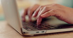 Laptop, online and hands of person typing research study, email communication or college project, report or planning. Tech, closeup keyboard and student working on article, story or university essay