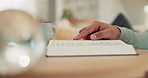 Hand, person reading book or bible study for faith, religion or research in holy spiritual scripture. Christian literature, studying or story for education or knowledge to worship God or Jesus Christ
