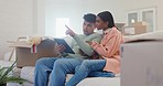 Smart home, man and woman on sofa with tablet, setting for security and automation in new house. Future technology, couple on couch with boxes and digital app, control of online apartment management.