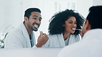 Interracial couple, brushing teeth and mirror in dental hygiene, morning routine or care in bathroom at home. Happy man and woman cleaning mouth, oral or gums in happiness or tooth whitening together