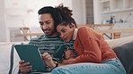 Couple, sofa and tablet for home internet, streaming service and watch video or social media. Young man and woman hug or relax on couch and digital technology, film or movie with website subscription