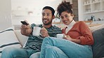 Couple, watching tv and talk with coffee on sofa, relax and streaming subscription in home living room. Man, woman and smile with movie, video and chat on couch for matcha, coco or latte in lounge