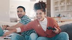 Couple, gaming and sofa with controller, laugh and funny conflict with cheating, blind and push for contest in home. Man, woman and video game competition with play fight, esports and happy on couch