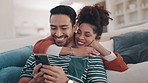 Happy couple on sofa with phone, laughing and hug with social media meme on funny internet video in home. Love, man and woman relax on couch with smartphone, checking online post or joke on website.