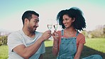 Champagne, toast and couple on picnic in nature, happy and relax in a park for romantic date or celebration. Love, cheers and man with woman on field with wine, drink and bond, anniversary or travel