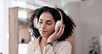 Business woman, headphones and laptop music for work from home, mental health and wellness podcast. Young african person, freelancer or worker listening to audio subscription and typing on computer