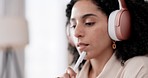 Business woman, laptop and thinking in headphones for work from home ideas, podcast and music. Young african person, freelancer or worker listening to audio, planning and online choice or inspiration