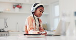 Headphones, typing and child with a laptop at home for e learning, education and online quiz. Young student girl kid thinking and technology for internet question, school work and development test