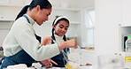 Girl, helping and mom teaching cooking in kitchen or learning, baking with food in home with family recipe or knowledge. Child, help and mother show kid how to bake a cake, dessert or cookies